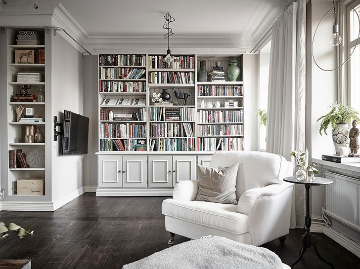 Приятный интерьер квартиры с библиотекой в Швеции (95 кв. м)